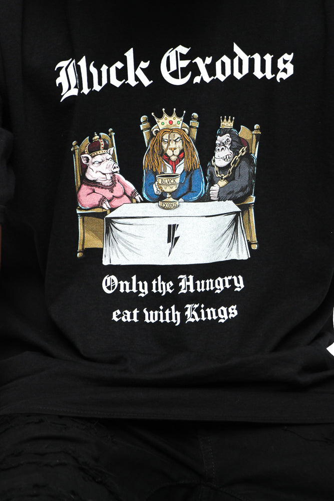 Black short-sleeve t-shirt vintage graphic of animals sitting at a table with the text "Only the Hungry Eat with Kings" in a bold, gothic font, and the Blvck Exodus logo.