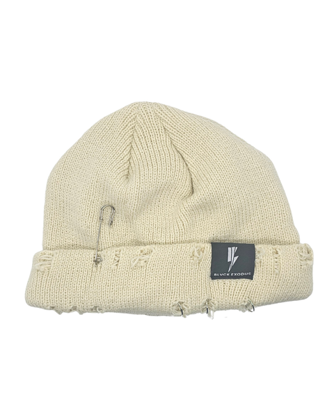 Cream distressed beanie with Blvck Exodus logo, safety pins, streetwear, urban fashion, Christian apparel, winter hat, beanie hat